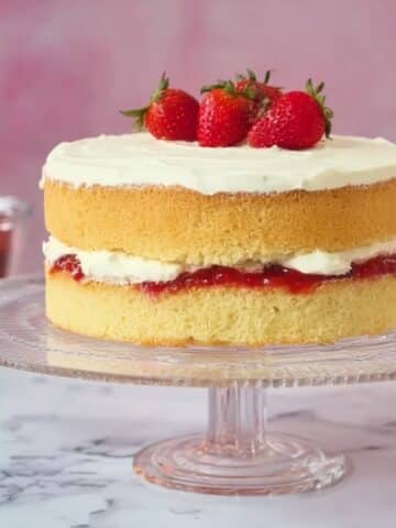 Light and Airy Vanilla Sponge Cake with Raspberry Jam and Fresh Strawberries Recipe
