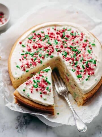 Sugar Cookie Cheesecake with Cookie Dough Bites and Sour Cream Frosting Recipe