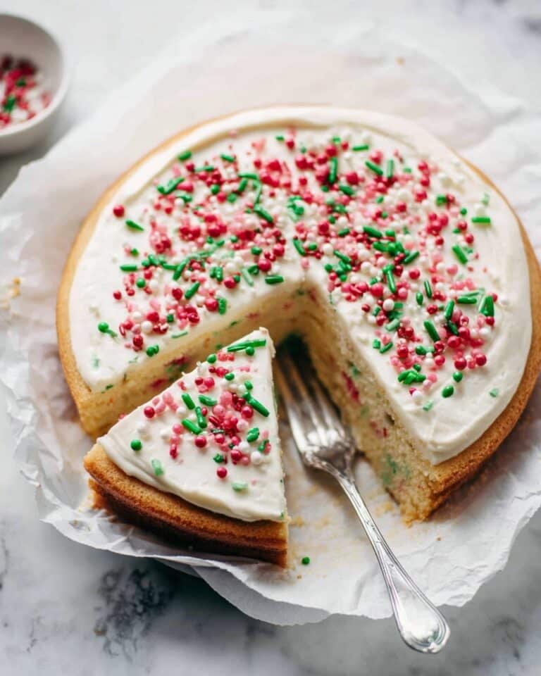 Sugar Cookie Cheesecake with Cookie Dough Bites and Sour Cream Frosting Recipe