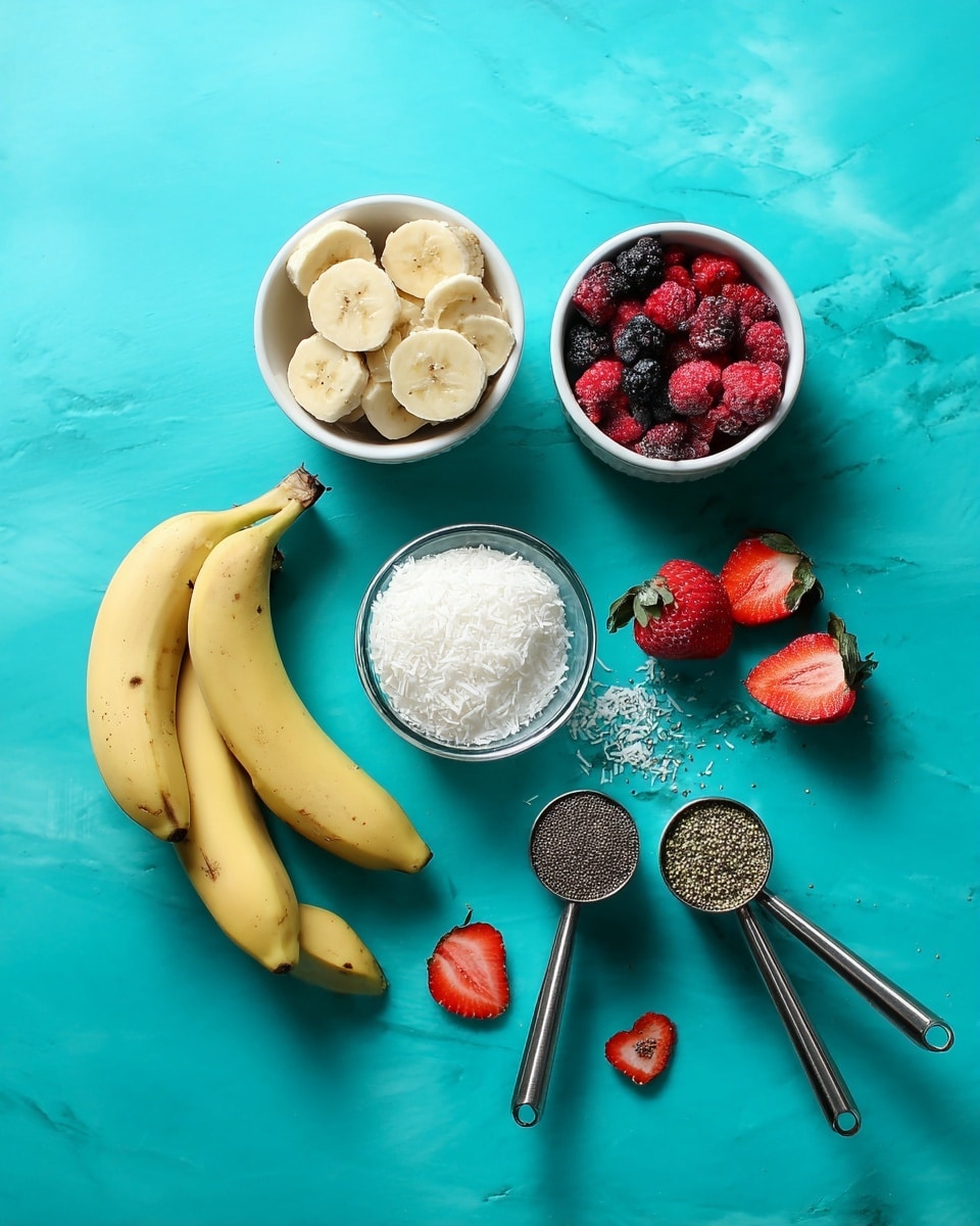 The image shows two whole yellow bananas on the bottom left with a small white bowl above holding round slices of banana. Above that is a small white bowl with white shredded coconut. To its right is a small white bowl of mixed frozen berries, red and dark purple in color. Fresh red strawberries sit on the right side with a few sliced strawberry pieces scattered near the bowls. Below, a small white bowl of white creamy liquid is present, with two metal scoops angled to the lower right filled with small chia seeds and hemp seeds respectively. All ingredients are on a bright turquoise background that should be imagined as a white marbled texture. Photo taken with an iphone --ar 4:5 --v 7