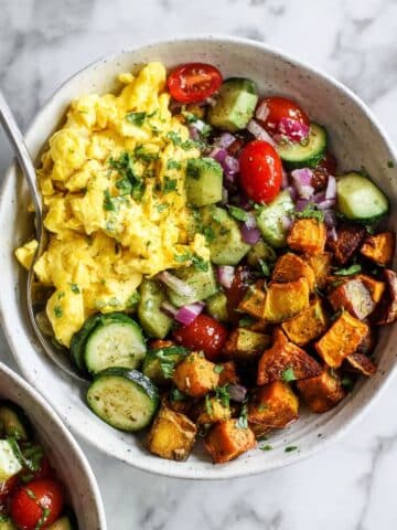 Sweet Potato Breakfast Bowl with Zucchini, Tomato Avocado Salad, and Scrambled Eggs Recipe