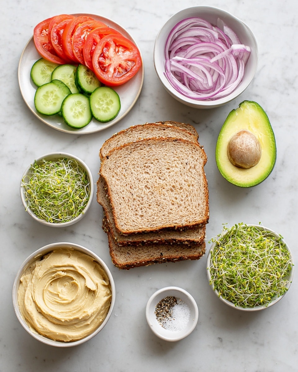 The image shows ingredients for a sandwich arranged on a white marbled surface. In the middle, there are four slices of whole grain bread stacked slightly overlapping, showing their brown, textured crust and seeds. To the right, there is a halved avocado with a bright green inside; one half has the pit, and the other is empty. Above the bread, there is a white bowl filled with thin red onion slices arranged loosely. To the left of the onion, a white plate holds sliced cucumbers on the top half and red tomato slices on the bottom half, all fresh and neatly placed. Below these, a white bowl contains fresh green alfalfa sprouts, and beneath that, a smaller white bowl is filled with tiny green microgreens. At the bottom left, there is a white bowl with creamy hummus, swirled on top. Finally, a small white dish with salt and pepper is placed near the bottom center. Photo taken with an iphone --ar 4:5 --v 7
