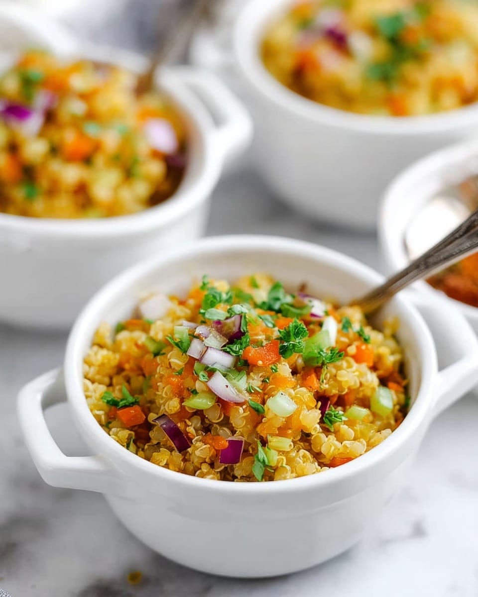 A white bowl filled with a colorful mix of cooked grains topped with small pieces of orange carrot, green onion slices, tiny bits of red onion, and fresh parsley sprinkled on top. The grains have a yellowish tint with a soft, fluffy texture, while the vegetables add vibrant green, orange, purple, and red colors to the dish. The bowl has small handles on the sides, and a silver spoon is placed inside the bowl. In the background, two more white bowls with the same food are slightly blurred, all placed on a white marbled surface. Photo taken with an iphone --ar 4:5 --v 7