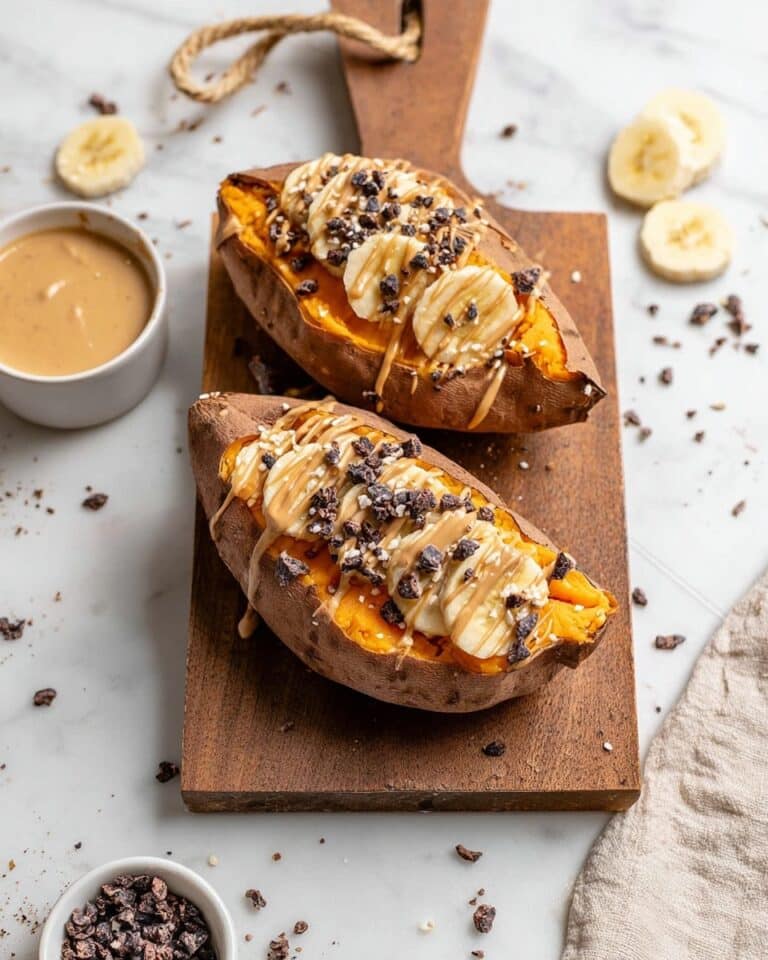 Breakfast Stuffed Sweet Potatoes with Peanut Butter, Banana, and Cacao Nibs Recipe