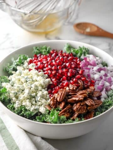 Winter Pomegranate Salad with Kale, Cabbage, and Orange-Maple Vinaigrette Recipe