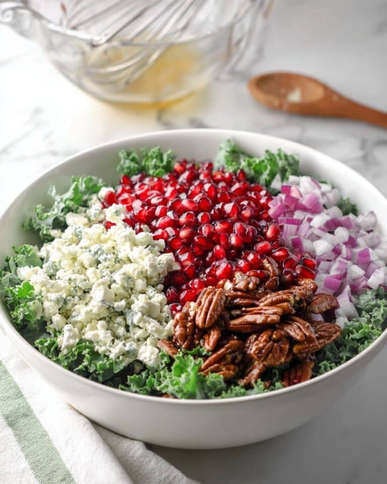 Winter Pomegranate Salad with Kale, Cabbage, and Orange-Maple Vinaigrette Recipe
