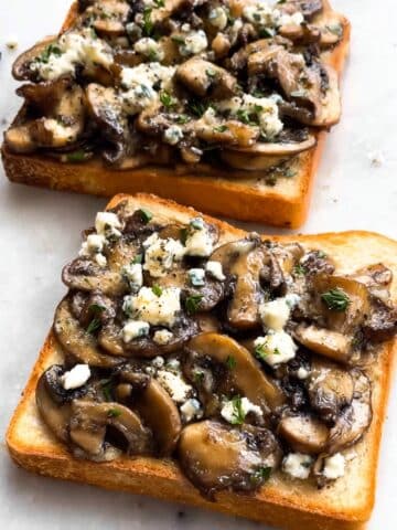 Garlicky Caprese Toasts with Melted Mozzarella, Fresh Tomatoes, and Basil Recipe
