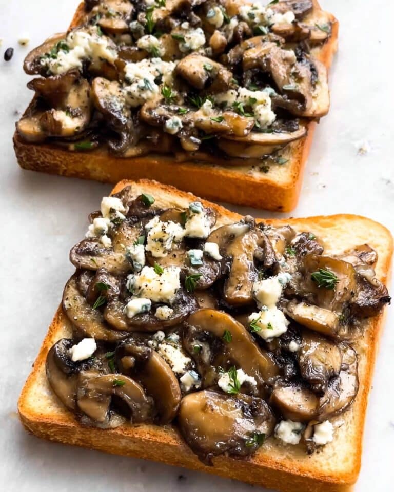 Garlicky Caprese Toasts with Melted Mozzarella, Fresh Tomatoes, and Basil Recipe