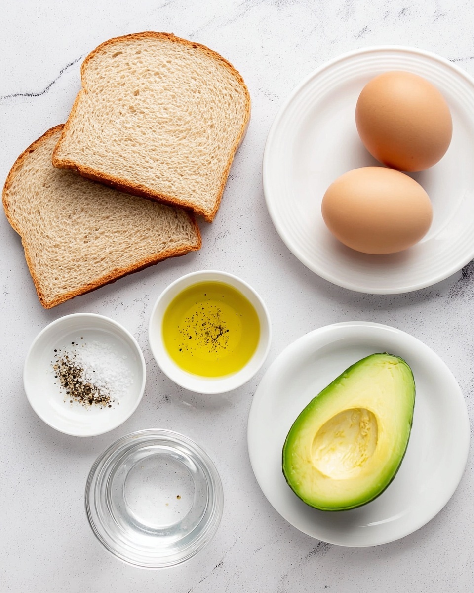Avocado Toast with Egg 4 Ways Recipe 4 The image shows two slices of light brown bread with a soft texture placed on a white marbled surface in the top left corner, next to two smooth brown eggs positioned below them. To the right, there is a white plate holding one half of a bright green avocado with its seed removed, showing the creamy pale green inside. Below the bread and eggs, there are three small white dishes: one with black pepper and white salt mixed, one with golden yellow olive oil, and one with clear water, all placed neatly on the same white marbled surface. Photo taken with an iphone --ar 4:5 --v 7