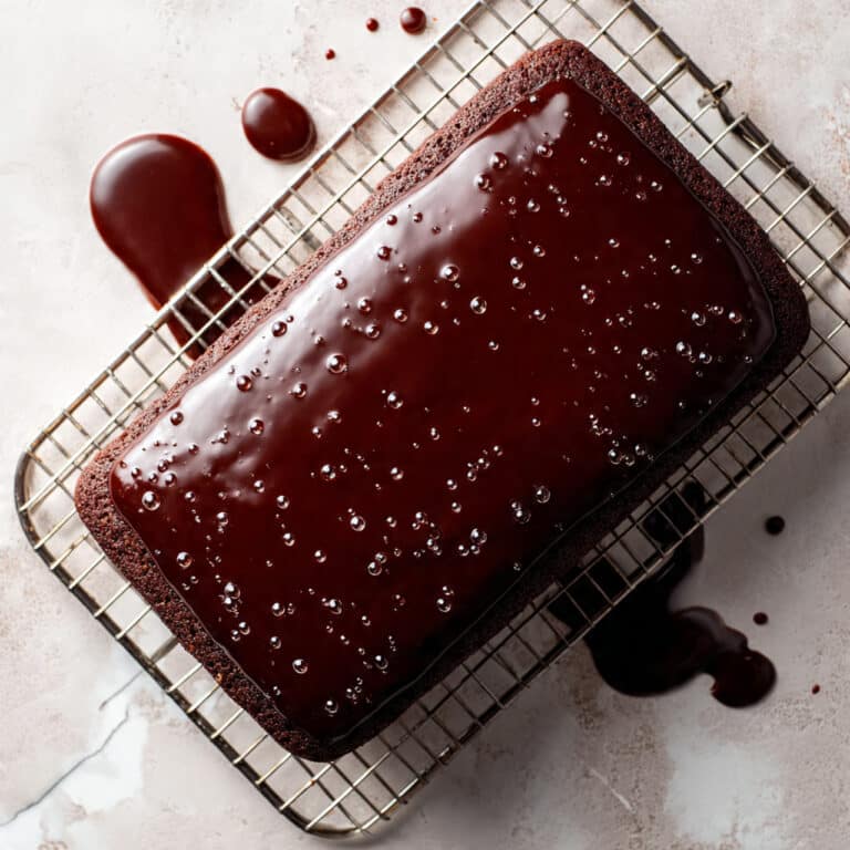 Piernik: Traditional Polish Gingerbread Cake with Almond Paste, Plum Jam, and Honey Chocolate Ganache Recipe