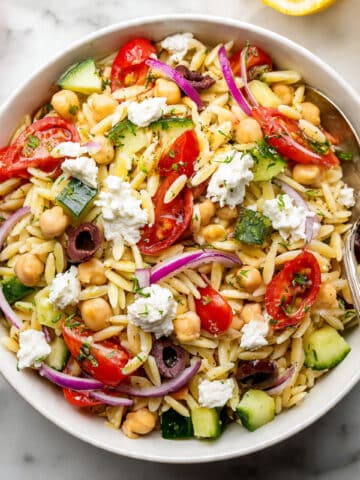 Greek Orzo Salad with Cherry Tomatoes, Cucumber, Olives, Chickpeas, and Feta Recipe