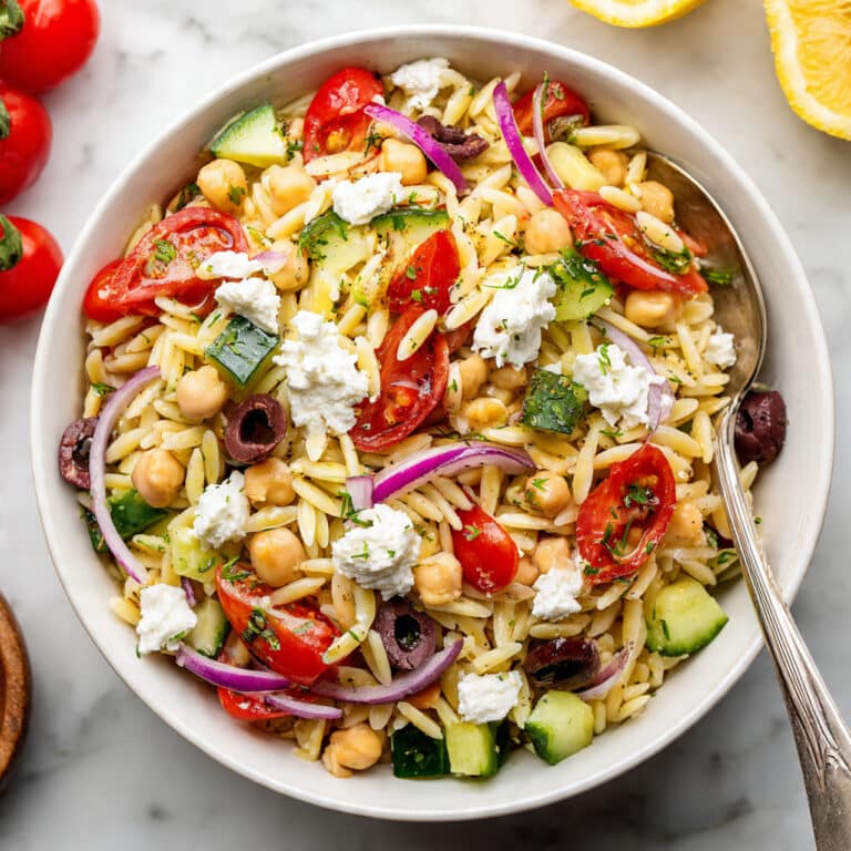 Greek Orzo Salad with Cherry Tomatoes, Cucumber, Olives, Chickpeas, and Feta Recipe