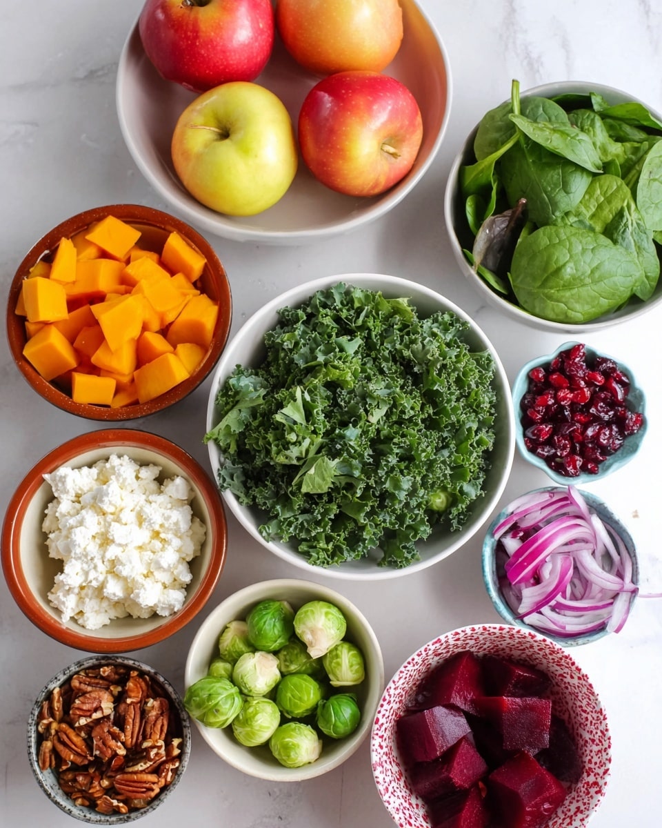 The image shows a collection of small bowls arranged on a white marbled surface, each filled with different fresh salad ingredients. In the center, a white bowl contains bright green curly kale leaves, and just below it, another white bowl holds fresh spinach leaves. To the left, a white bowl is filled with bright orange cubed butternut squash, while just above that, a terracotta bowl contains white cottage cheese. On the top left, a white bowl holds three shiny red apples with yellow highlights. To the right side, a white bowl is packed with green Brussels sprouts. Small bowls around the center hold thin purple onion slices, dark dried cranberries, chopped pecans, and ruby red pomegranate seeds. At the bottom right, a white bowl with a delicate red pattern contains deep red cubed beets. The overall scene is bright with clean colors and fresh textures, suggesting a healthy, colorful salad preparation photo taken with an iphone --ar 4:5 --v 7