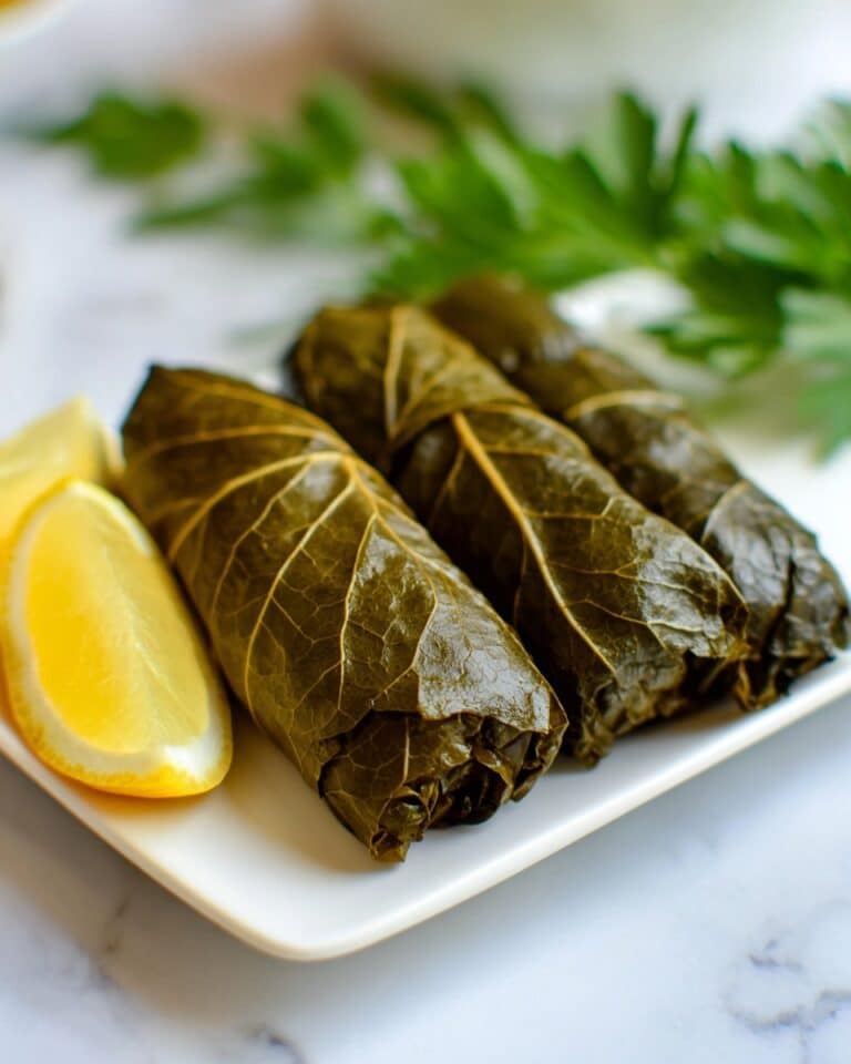 Stuffed Grape Leaves with Rice, Herbs, Pine Nuts, and Lemon Recipe