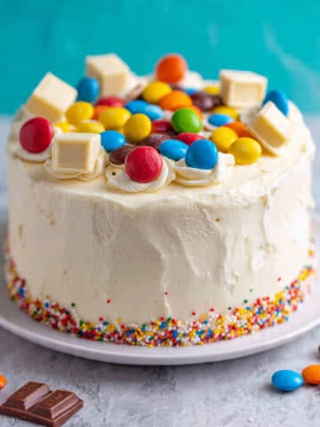 Neapolitan Cake with Vanilla, Strawberry, and Chocolate Layers Recipe