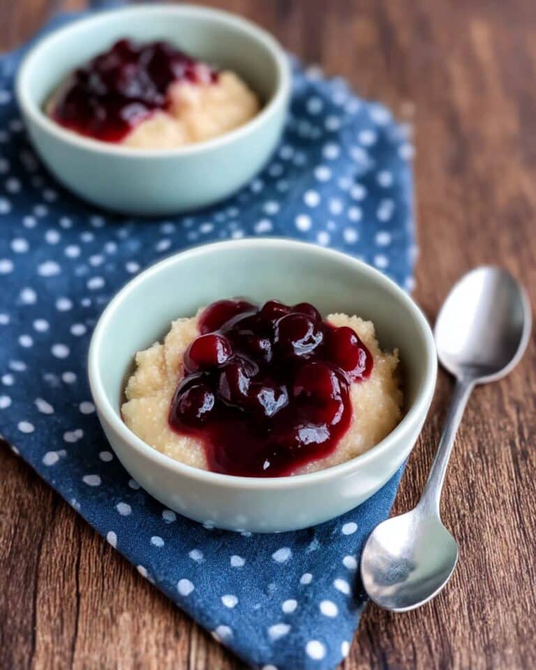 Baked Rice Pudding with Cinnamon, Berry Jam, and Cream Recipe