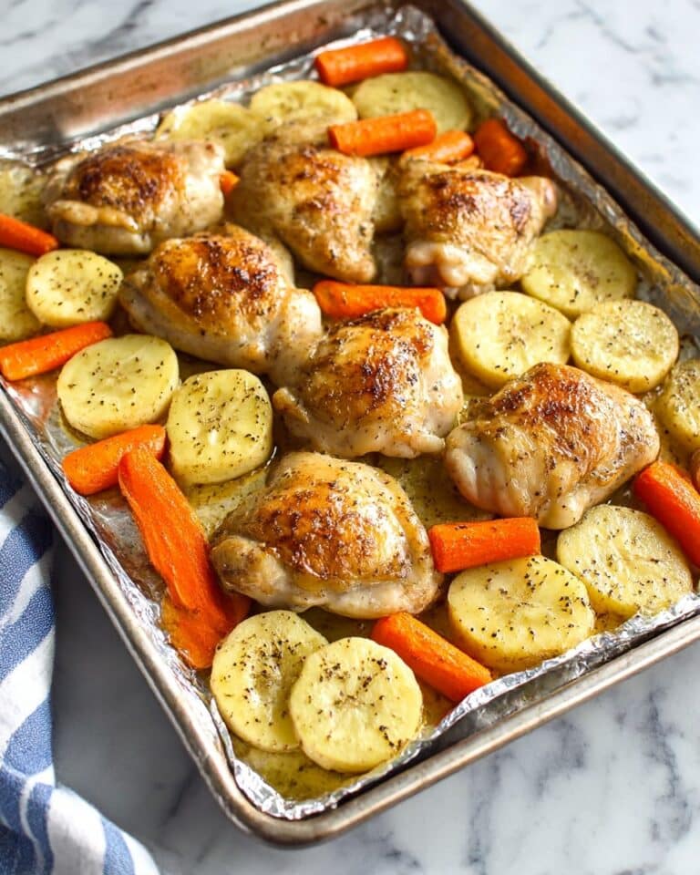 Za'atar Marinated Roast Chicken Th thighs with Roasted Potatoes and Carrots Recipe