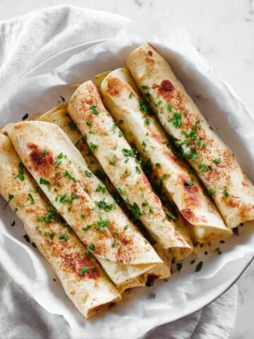 Musakhan Rolls with Shredded Chicken, Sumac, and Toasted Almonds Recipe
