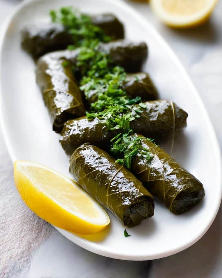 Dolmadakia-Stuffed Grape Leaves with Yogurt and Herb Sauce Recipe