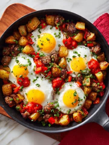 Skillet Sausage and Potatoes with Crispy Eggs and Tomato Relish Recipe