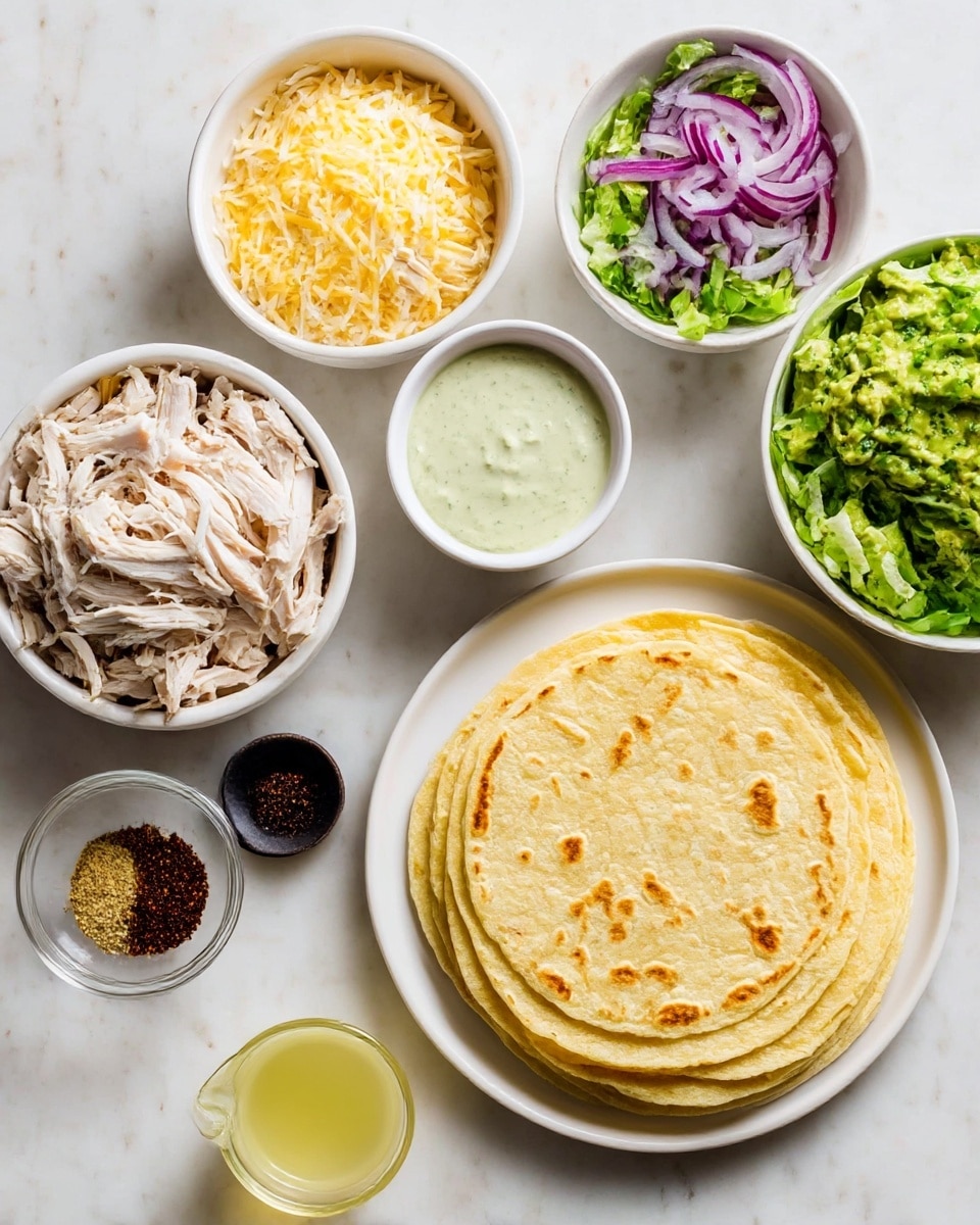 The image shows a flat white plate with a small stack of three light yellow corn tortillas with visible grill marks arranged neatly on the right side. Around the plate, there are seven small white bowls and cups containing various ingredients: shredded chicken in the center bowl with pale beige and slightly darker tones, shredded yellow and white cheese filling a bowl on the left, fresh chopped green lettuce in a bowl on the far right, bright green mashed avocado in a bowl near the top right, thinly sliced purple onions in a small bowl at the top center, a small cup with light green creamy sauce with herbs near the top left, and a tiny black dish containing dark reddish-brown spice near the bottom center. A small transparent cup with pale yellow liquid is also included below the chicken bowl. The arrangement is on a white marbled surface, creating a clean and fresh look. photo taken with an iphone --ar 4:5 --v 7