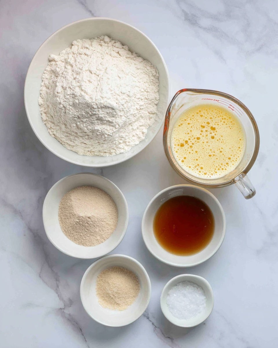 The image shows six bowls of different sizes arranged on a white marbled surface. On the left top, there is a large white bowl filled with a mound of white flour that has a soft, powdery texture. To its right, there is a clear glass measuring cup with a yellow liquid mixture, frothy on top and partly transparent with bubbles. Below, three small white bowls are placed in a triangle shape: the left one contains light brown fine granules, the middle one has a pale beige powder, and the bottom one holds a thick amber-colored syrup. Finally, to the right of the syrup, there is another small white bowl filled with a small amount of white salt. The overall setting is neat, showing ingredients for baking or cooking. Photo taken with an iphone --ar 4:5 --v 7