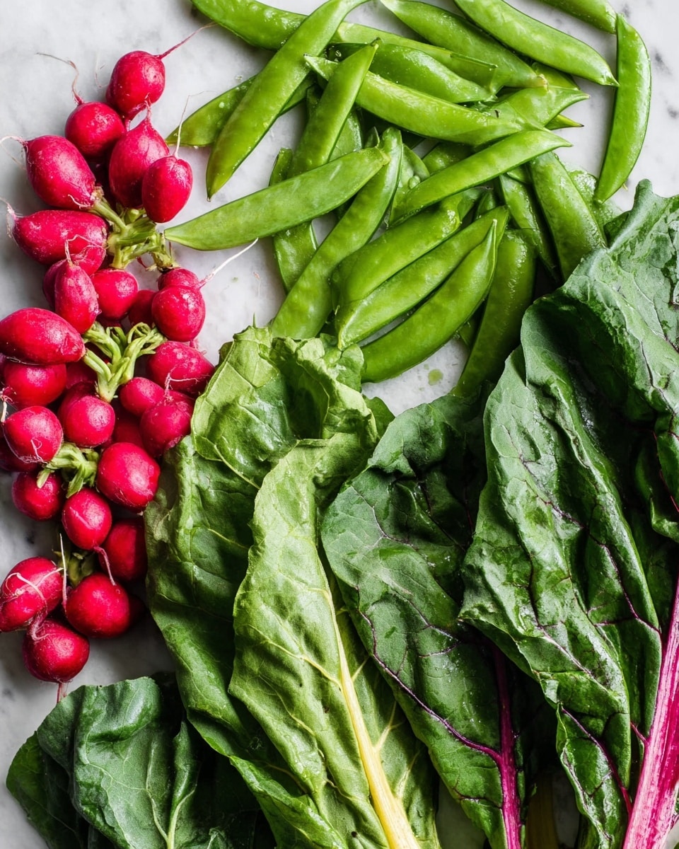 The image shows a bunch of fresh green pea pods spread out on a white marbled surface, filling most of the frame on the left and center. On the top left corner, there is a small cluster of vibrant red radishes with their roots attached. On the right side, several large dark green chard leaves with thick pale stalks and a few reddish and yellow stalks are placed, overlapping each other slightly. The overall look is fresh and colorful with a mix of greens, reds, and yellows, all laid out naturally in a casual arrangement. photo taken with an iphone --ar 4:5 --v 7
