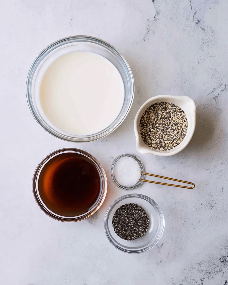 The image shows five containers with ingredients on a white marbled surface. On the top left is a large clear glass bowl filled with a smooth, white liquid. To the right of it, there is a small white bowl with a mix of black and beige specks. Below is a white measuring cup full of tiny black chia seeds with a light gold handle. Next to it on the right is a small empty clear glass bowl. At the bottom left corner, there is another clear bowl filled with a dark brown liquid. photo taken with an iphone --ar 4:5 --v 7