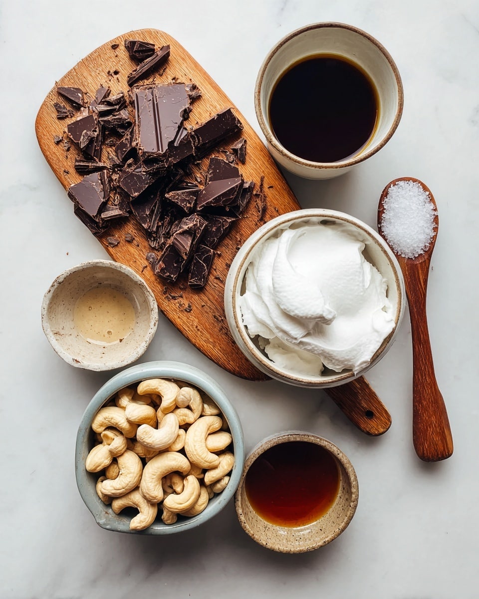 The image shows a wooden board placed on a white marbled surface. On the board, there are broken dark chocolate pieces scattered in the center-left side, and on the right side, a wooden spoon holds coarse white salt. Surrounding the board are four small ceramic bowls; at the bottom left, a bowl filled with pale cashew nuts, at the bottom center another bowl with white whipped cream or foam, to the top right a bowl with dark liquid (likely coffee or syrup), and just below it a spoon with some caramel-colored liquid. The colors range from dark brown chocolates and coffee to white cream and salt on a wooden board and bowls on a white marbled background, making the textures and layers clearly visible. Photo taken with an iphone --ar 4:5 --v 7