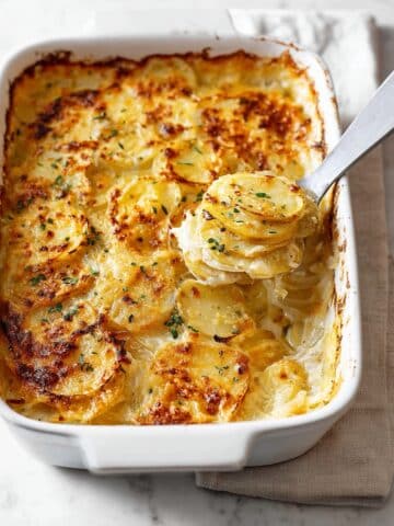 Cheesy Scalloped Potatoes with Garlic and Thyme Recipe