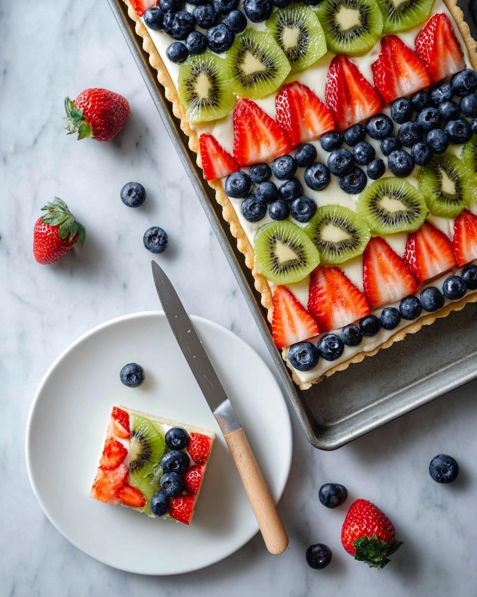 The image shows a fruit tart with four visible layers: the bottom layer is a pale golden crust, topped by a smooth white creamy layer, followed by neatly arranged rows of colorful fruit slices. The fruit layers alternate in rows of green kiwi slices, bright red strawberry halves, and dark blue blueberries. A square piece of the tart is cut and placed on a white plate with the same layered fruit decoration. The tart and plate are on a white marbled surface, with scattered whole blueberries and a strawberry around. A knife with a light wooden handle rests on the metal tray holding the tart. Photo taken with an iphone --ar 4:5 --v 7