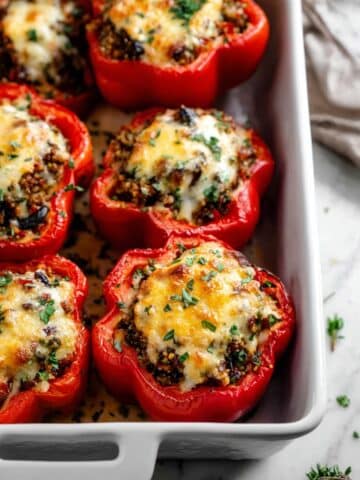Cheesy Stuffed Bell Peppers with Beef, Spinach, and Rice Recipe