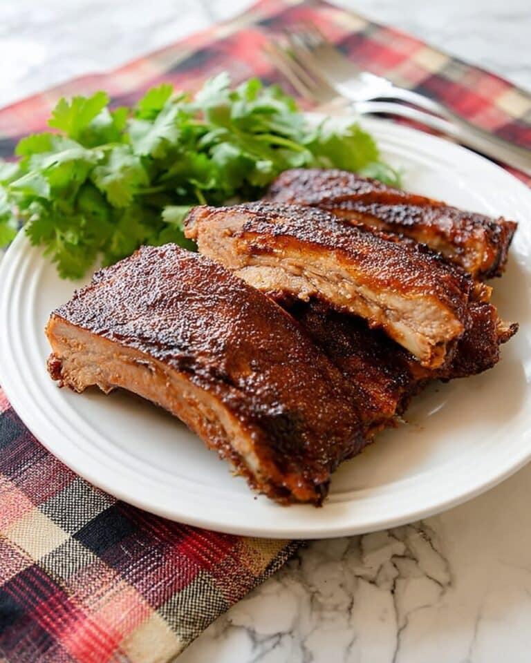 Oven Baked Ribs with Chili Pork Chicken Rub and Barbecue Sauce Recipe