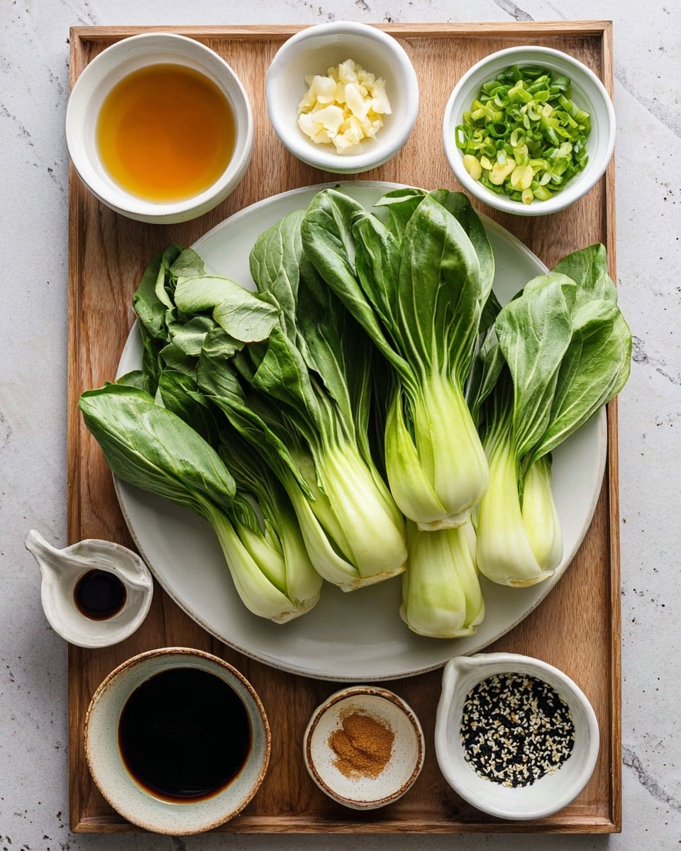 The image shows a white plate piled with three fresh bok choy heads with their crisp light green stalks and dark green leafy tops, placed on a wooden tray. Surrounding the plate are six small white bowls and one small ceramic bowl, each containing different ingredients: finely chopped garlic in one bowl, light amber liquid in another, dark soy sauce in a third, a small amount of light brown powder in the ceramic bowl, chopped green onions mixed with black sesame seeds in one bowl, and two other bowls with light brown and amber liquids. The whole setup is on a white marbled surface, neatly arranged and ready for cooking, photo taken with an iphone --ar 4:5 --v 7