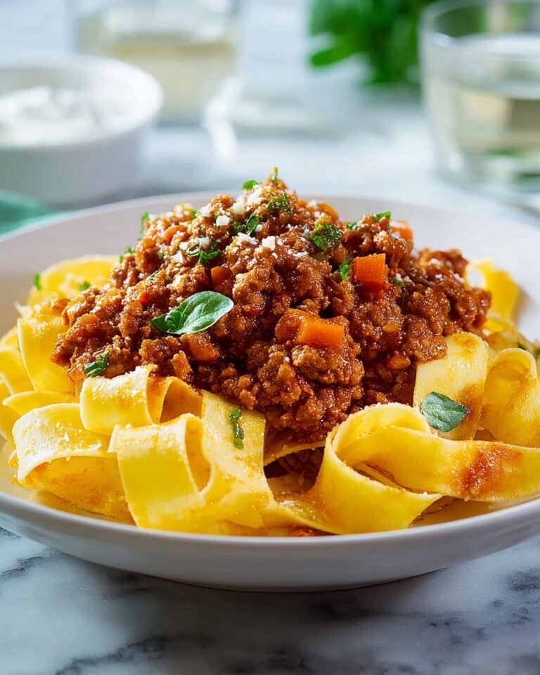 Beef and Sausage Bolognese with Fresh Basil and Parmesan Recipe