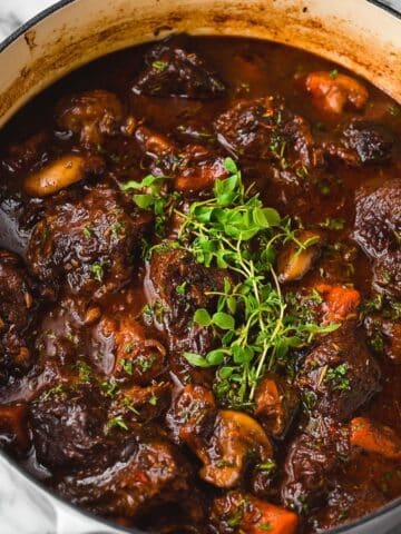 Braised Oxtails in Red Wine with Vegetables and Herbs Recipe