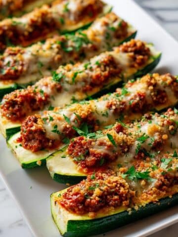 Stuffed Zucchini Boats with Sausage, Tomatoes, and Melted Cheese Recipe