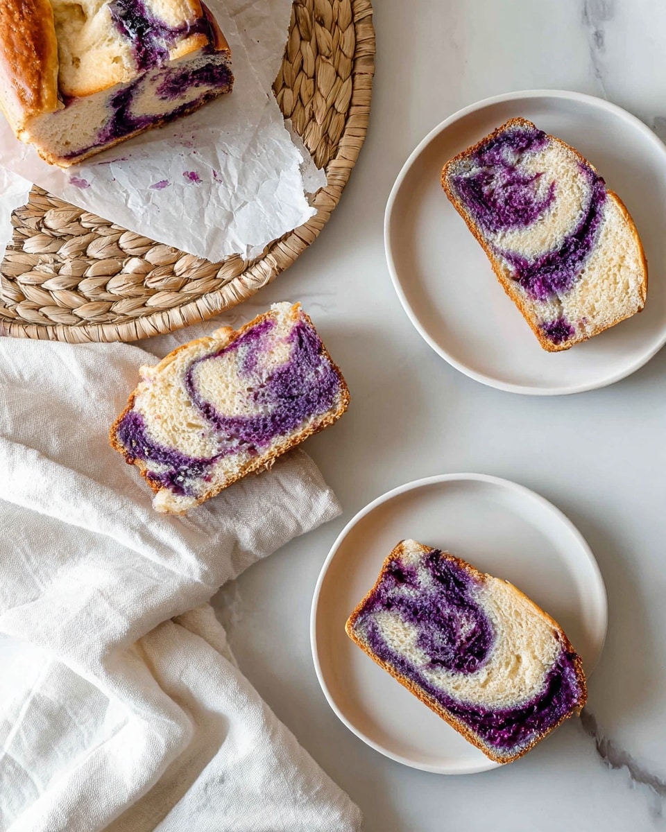A loaf of twisted bread with visible layers of golden brown dough wrapped around several layers of dark purple berry filling, creating a braided effect with some shiny, slightly darker spots on top. The loaf sits on crumpled white parchment paper on a white marbled surface. Photo taken with an iphone --ar 4:5 --v 7