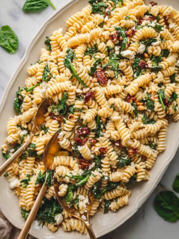 Goat Cheese Pasta Salad with Arugula, Sun-Dried Tomatoes, and Pistachios Recipe